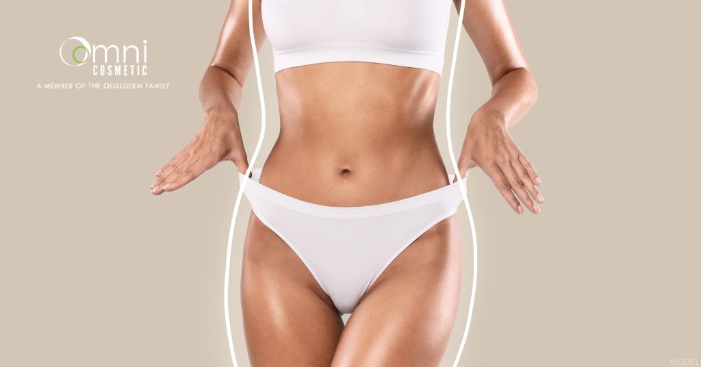Woman after a tummy tuck surgery. (Model)